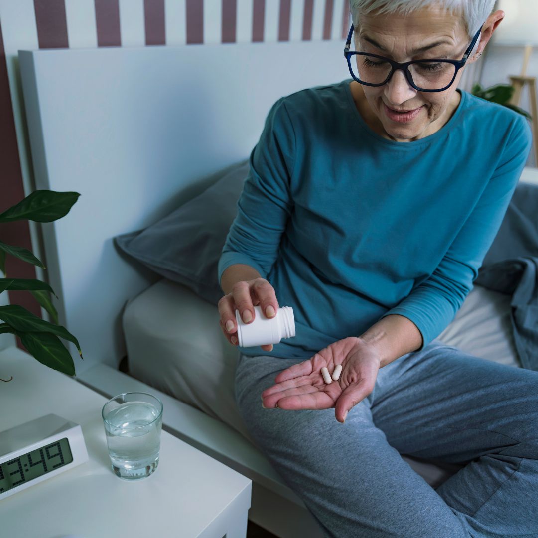 Woman taking melatonin