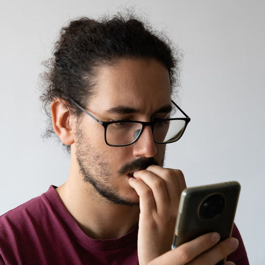 Man biting his nails. 