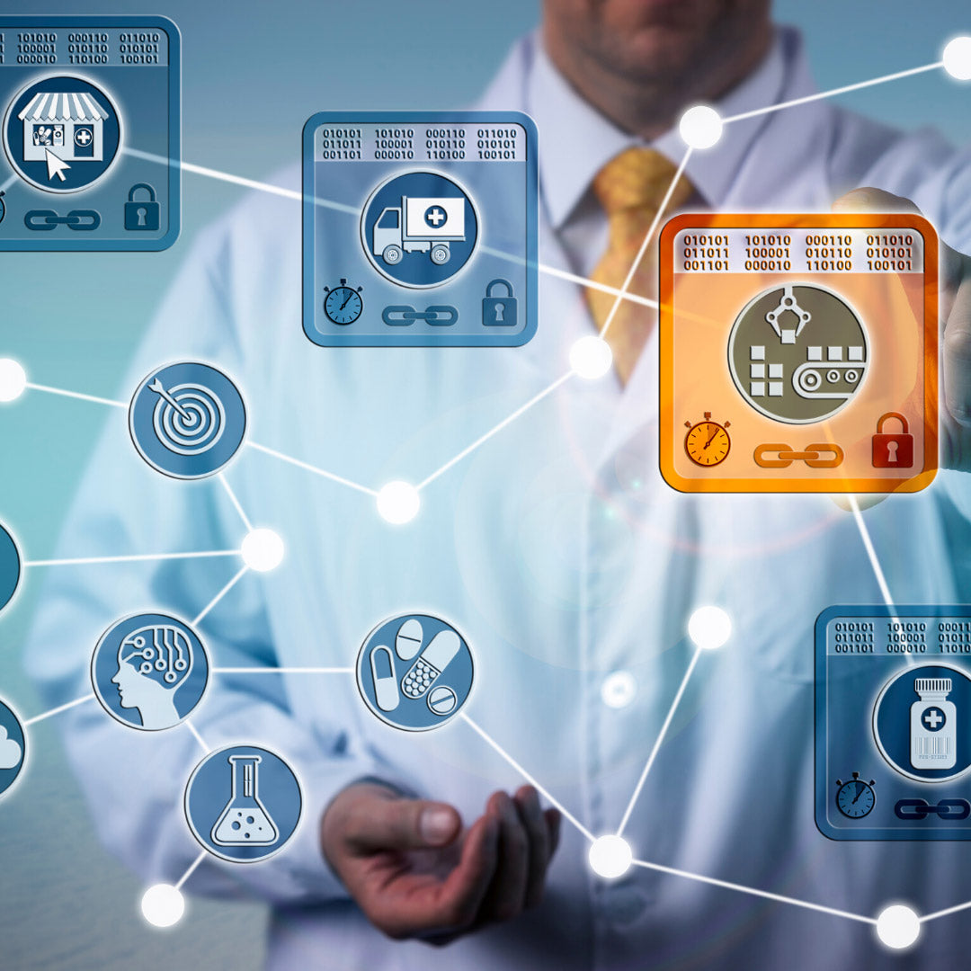 Doctor stands in front of a display of medical icons.