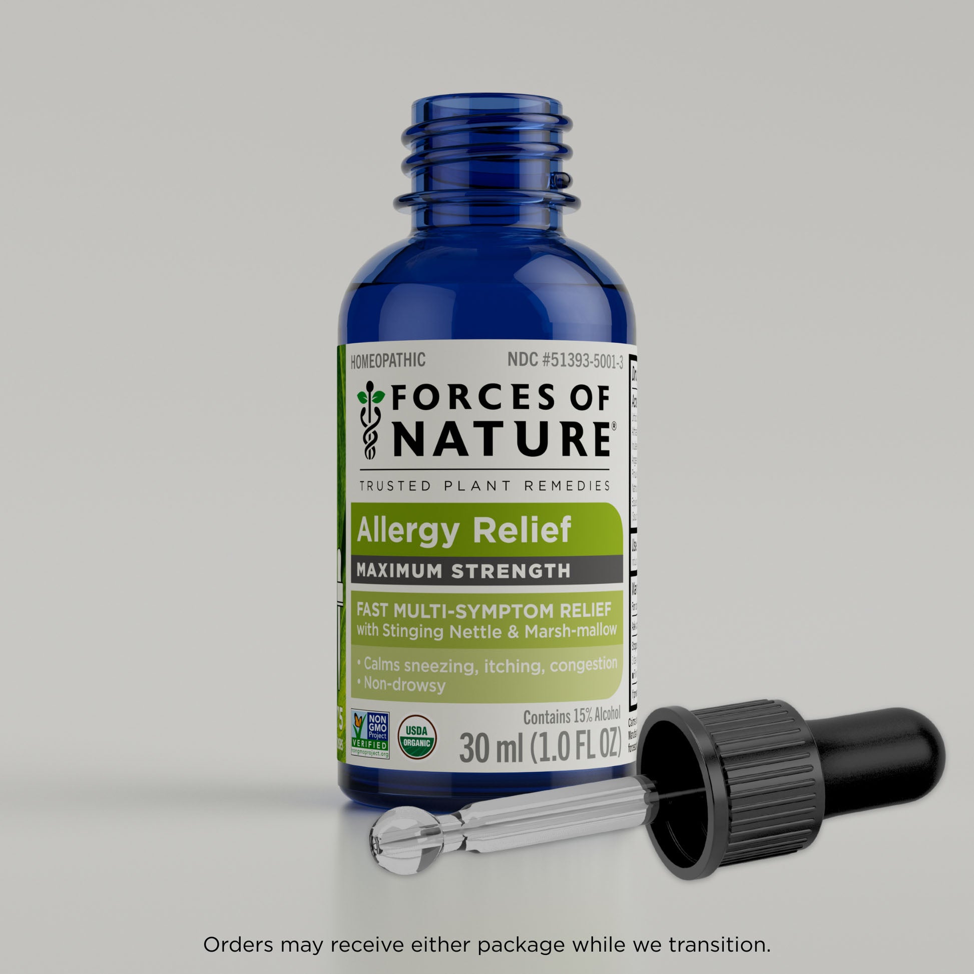 Bottle of Forces of Nature Allergy Relief with dropper on a gray background
